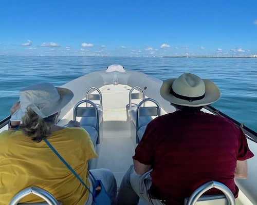 Couple on a private Miami Beach boat tour on a clear day in Miami.