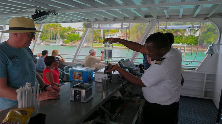 Cash bar with snacks aboard double-decker Island Queen cruises tour boat in Miami