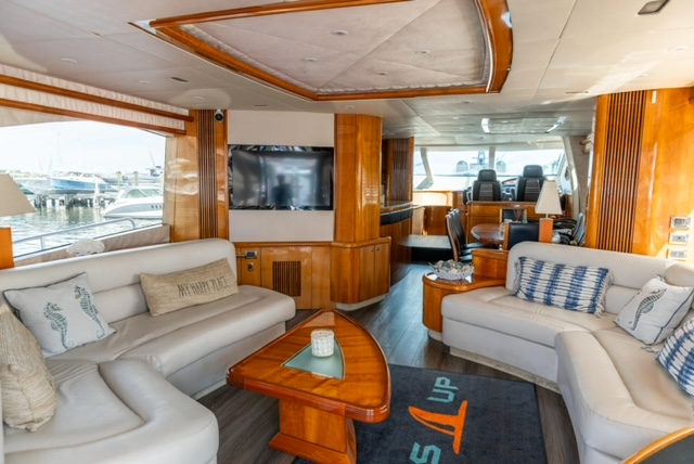 Salon of a luxury yacht for rent in Miami to cruise the crystal clear waters of Biscayne Bay.