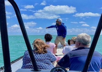 Ocean Force Adventures' guide, Nick pointing out sights to passengers during a tour in Biscayne National park.